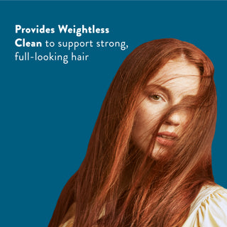 Woman with long red hair with text reading “Works to nourish, hydrate and cleanse your hair scalp”