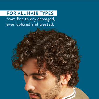 Man with curly hair and text reading “For all hair types from fine to dry damaged, even colored and treated”