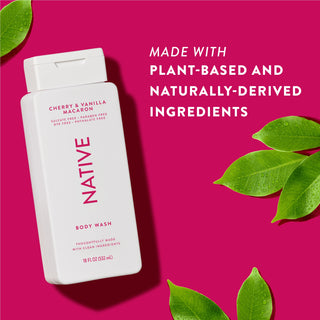 Native Cherry & Vanilla Macaron Body Wash with text reading “Made with plant-based and naturally-derived ingredients” next to green leaves