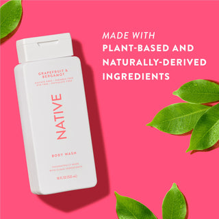 Native Grapefruit & Bergamot Body Wash with text reading “Made with plant-based and naturally-derived ingredients” next to green leaves