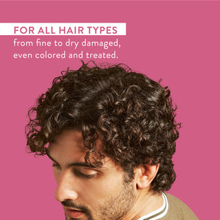 Man with curly hair and text reading “For all hair types from fine to dry damaged, even colored and treated”