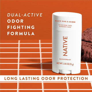 Native Black Oak & Amber Deodorant sitting on counter with text promoting "Dual-active, odor fighting formula"