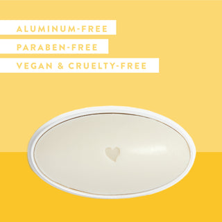 Inside of Native Buttercream & French Vanilla deodorant laid flat on yellow background