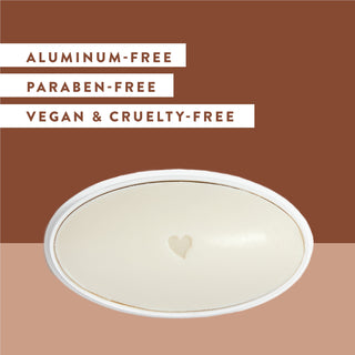 Inside of Native Coconut & Vanilla deodorant laid flat on beige background