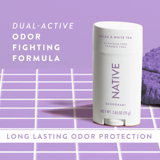 Native Lilac & White Tea Deodorant sitting on counter with text promoting "Dual-active, odor fighting formula"