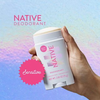 Hand holding Native sensitive deodorant