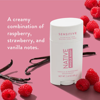 Native Whole Body Deodorant with raspberries and vanilla pods on pink background with text reading A creamy combination of raspberry, strawberry, and vanilla notes