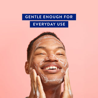 Smiling man washing her face with Native facial cleanser, with text reading "Gentle Enough for Everyday Use" above