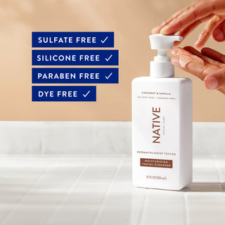 Hand using Native Moisturizing Facial Cleanser pump, with text listing sulfate-free, silicone-free, paraben-free and dye-free claims