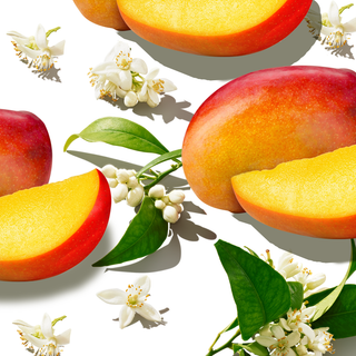 Mangoes and mangoes slices styled with orange blossoms