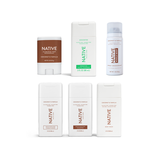 Arrangement of native products in travel size version, Deodorant stick, Sensitive Facial Cleanser, Whole Body Deodorant, Moisturizing Conditioner, Moisturizing Shampoo, and Body Wash