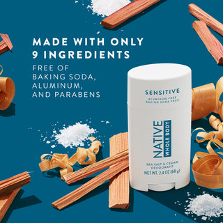 Native Whole Body Deodorant with sea salt and cedar wood on teal background