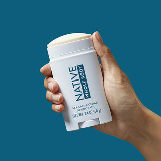 Hand holding Native Sea Salt & Cedar Whole Body Deodorant Stick