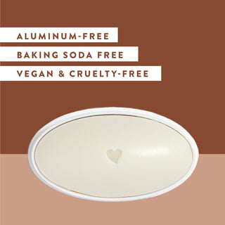 Inside of Native Coconut & Vanilla sensitive deodorant laid flat on brown background