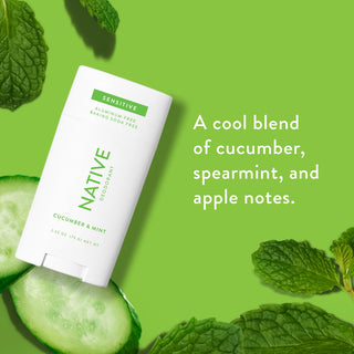 Native sensitive deodorant with text saying "A cool blend of cucumber, spearmint, and apple notes", styled with cucumber leaves and cucumber slices