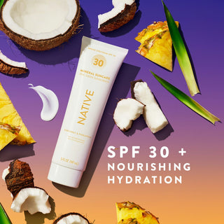 Native Coconut & Pineapple Sunscree next to "SPF 30+, Nourishing Hydration" text, styled with coconut and pinneapple slices 