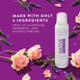 Flat-lay of Native Whole Body Deodorant with lavender and roses on purple background with text reading "Made with only 6 ingredients free of aluminum, parabens, and hydrocarbons"